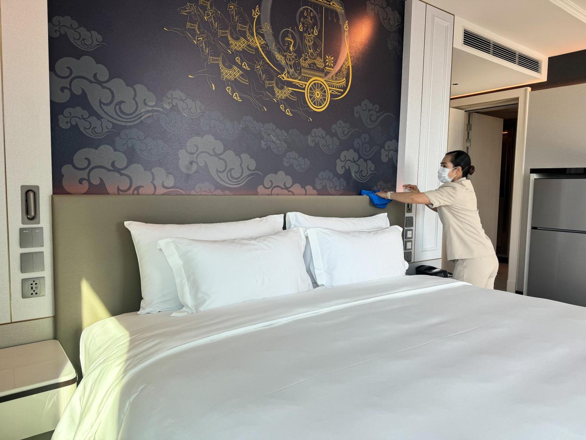 Hotel Grande Centre Point Surawong Bangkok Esterno foto A hotel room being disinfected in Bangkok, Thailand